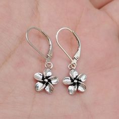 (1)Metal Material: sterling silver (2)Flower Size: length 12.5mm, width 9.5mm (3)Leverback Size: length approx 17mm, width approx 10mm (4)Package: in a bubble emailer For more earring, please find here: https://www.etsy.com/shop/LBCreatives?ref=seller-platform-mcnav§ion_id=32032126 Sterling Silver Flower-shaped Jewelry With Matching Earrings, Sterling Silver Flower Charm Earrings, Hypoallergenic Sterling Silver Flower Earrings, Sterling Silver Flower-shaped Earrings, Sterling Silver Dangle Earrings With Flower Charm, Nickel-free Sterling Silver Teardrop Flower Earrings, Silver Teardrop Flower Earrings In Sterling Silver, Nickel-free Sterling Silver Drop Flower Earrings, Silver Sterling Silver Flower Charm Earrings