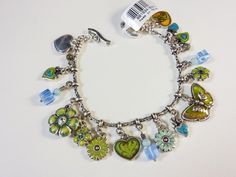 Brighton Vintage item Toggle charm bracelet 7.25" We ship by USPS within 48 hours on Monday – Friday. We ship to the United States only.  We will combine postage if you make a request prior to paying. We are happy to answer questions about our listings and strive for 5-star service for our customers.   Have a great day!  Got Ya Covered Returns not accepted.  Please read descriptions and look at pictures carefully.  See clothing measurements to determine size. Turquoise Metal Charm Bracelet Gift, Turquoise Metal Charm Bracelet As Gift, Green Charm Bracelet With Lobster Clasp As Gift, Green Metal Charm Bracelet For Gift, Green Metal Charm Bracelet Gift, Dream Bracelet, Set Ideas, Button Bracelet, Bracelet Charms