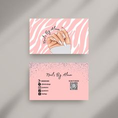 two business cards with pink and white designs on them, one has a manicure