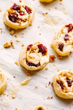 cranberry white chocolate cookies on parchment paper