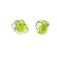 This listing is for raw peridot sterling silver stud earrings. Available as a single stud or a pair! Not only is Peridot a birthstone for August but Peridot is a stone of Balance and Compassion. Help her stay balanced by gifting these dainty 925 sterling silver Peridot claw pronged stud earrings. Earring diameter ranges from 4-6 mm. All items are shipped in Lea Spirit™ signature packaging including crystal and gemstone description cards, ready for gifting! Every piece is made to order, lovingly Peridot Earrings As A Gift, Fine Jewelry Peridot Earrings As Gift, Peridot Earrings In Lime Green As A Gift, Peridot Lime Green Earrings As Gift, Fine Jewelry Peridot Earrings For Gift, Lime Green Sterling Silver Earrings For Gift, Lime Green Peridot Earrings As Gift, Peridot Gemstone Earrings, Handmade Round Peridot Earrings