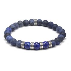 This bracelet features natural 8mm lapis lazuli beads, and 8mm matte sodalite beads accented with five handmade sterling silver hammered "dots" beads. Strung with clear silicon-based stretch cord for extra strength and durability. Select your size from the drop down menu. Add 1/2 inch to your wrist measurement for a comfortable fit. Your bracelet comes in a canvas pouch. Please measure your wrist is you are unsure of the size. Returns are only accepted on customized items if the order is defective or damaged. Sapphire Lapis Lazuli Bracelets With Round Beads, Adjustable Lapis Lazuli Bracelet With 8mm Beads, Sapphire Gemstone Beads Bracelet In Lapis Lazuli, Blue Lapis Lazuli Bracelets With Polished Beads, Sapphire Lapis Lazuli Beaded Bracelets, Sapphire Lapis Lazuli Beaded Bracelet With Natural Stones, Sapphire Lapis Lazuli Gemstone Beaded Bracelets, Blue Lapis Lazuli Beaded Bracelets With Polished Beads, Adjustable Sodalite Beaded Bracelets With 8mm Beads