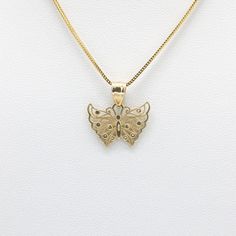 Created in 14k yellow gold, this openwork butterfly pendant is cute and dainty. This pendant is perfect for all the butterfly lovers out there! The chain pictured is for illustration purposes only and may be purchased separately. 14k solid yellow gold 13.9mm tall excluding bail x 19mm wide All measurements are approximate Chain is not included Product color may differ due to lighting 14k Yellow Gold Butterfly Pendant Necklace, 14k Gold Butterfly Pendant Necklace, 14k Gold Butterfly Charm Pendant Necklace, 14k Gold Butterfly Necklace Pendant, Sterling Silver Yellow Gold Butterfly Pendant Necklace, Butterfly Pendant, The Butterfly, Solid Yellow, Gold Necklace