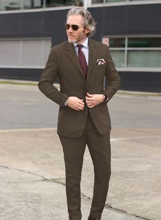 Pursue the subtly charming elegance with our Italian Prato Brown Linen Suit. Nevertheless, our suit is made from a pure linen fabric which showcases a calm, uniformly smooth glance, including airy and supple characters making a brilliant choice for hot and humid climates. Besides, the cloth is covered with a solid finish over a brown hue, a dapper edge to the persona. Furthermore, complement the signature standout looks with detailed tailoring, which keeps things classic with premium fit, so mak Classic Linen Suits For Workwear, Elegant Linen Suits With Notch Lapel, Formal Linen Blazer With Suit Collar, Timeless Linen Formal Suits, Linen Blazer With Pressed Crease For Office, Timeless Linen Suit For Formal Occasions, Timeless Linen Suit, Timeless Formal Linen Suit, Elegant Linen Blazer With Suit Collar