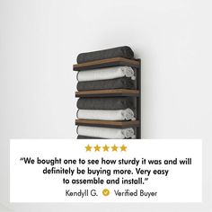 a shelf with folded towels on it next to a quote from kendall g verified buyer