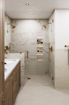 a bathroom with marble walls and flooring next to a walk - in shower stall