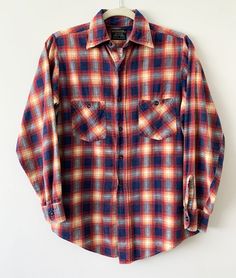 "Description: Vintage 60s JCPenney plaid printed flannel button down long sleeve shirt. Condition:  Great. (Small fraying near underarm - Please see pics). Measurements: Approx. Length: 29\" (HPS), Chest (Flat across the underarm): 20 1/2\", Sleeve length (Including cuff): 23\" ALL SALES FINAL - Please check and compare measurements to something you own before purchasing. Most of my products are vintage/used, so please check pictures and feel free to ask questions. Thank you." Cheap Vintage Plaid Flannel Shirt, Yellow Plums, Black Harley Davidson, Black Pleated Skirt, Vintage 60s, Women's Plaid Shirt, Pleated Skirt, Vintage Black, Long Sleeve Shirt