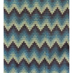 a blue and brown knitted fabric with wavy lines on the top, in different shades