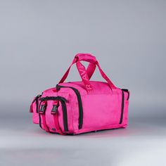 This is a MINI Duffle, check the size before ordering! Introducing your new mini travel companions: Perfect for carrying essentials. Whether it's for a quick gym session, a day trip, or as a carry-on during travel or range bag... these bags are designed to hold just enough without being bulky or cumbersome Perfect for Adults and/or Children The 20L Mini Duffle Bag made with 1000D Oxford Waterproof Material and YKK Zippers and Clamps. This exceptional bag is meticulously designed to cater to all Multifunctional Rectangular Duffle Bag For School, Functional Pink Luggage For Daily Use, Multifunctional Rectangular Gym Bag For Outdoor Activities, Functional Rectangular School Luggage, Pink Rectangular Luggage For Outdoor Activities, Rectangular Pink Luggage For Outdoor Activities, Practical Rectangular Duffle Bag For School, Practical School Duffle Bag, Practical Rectangular School Duffle Bag