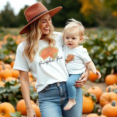 Mama and Mamas Little Pumpkin Toddler tee shirt and baby bodysuit.  UNISEX T-SHIRT * Medium fabric, consisting of high quality, 100% ring-spun US cotton for long-lasting comfort. * The relaxed fit keeps the wearer comfy in both casual and semi-formal settings while the crew neckline delivers that classic, neat style which makes it perfect for accessorizing.  *  The pre-shrunk fabric ensures a consistently great fit.  * Made using 100% US cotton that is ethically grown and harvested. Gildan is al Cute Summer T-shirt For Parenting, Playful T-shirt For Fall Playtime, Playful T-shirt For Playtime In Fall, Cute Fall T-shirt For Playtime, Fall Playtime Tops With Short Sleeves, Family Matching Short Sleeve Tops For Fall, Playful Short Sleeve T-shirt For Fall, Playful Summer Family T-shirt, Playful Short Sleeve Fall T-shirt