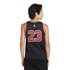 Just like Mike. The Jordan '23' youth jersey is inspired by the original so kids can feel like the legend, Michael Jordan himself. Perfect for playtime on the court or for wearing with their favorite J's. Jordan standard fit. Knit mesh fabric. Ribbed neckband and armholes. Fabric: 100% polyester. Imported. Black Team Logo Jersey For Basketball, Black Basketball Jersey With Team Logo, Black Basketball Jersey With Letter Print, Collegiate Black Sleeveless Top, Throwback Black Jersey For Sports Season, Black Casual Basketball Jersey, Sleeveless Black Jersey With Team Logo, Varsity Basketball Jersey Tops, Black Sportswear Tops For Game Day