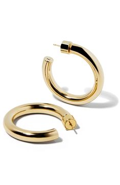 Refine everyday looks with the high-polish shine of these hoop earrings. 1" diameter; 1/4" width Post back 14k-gold plate Imported Classic Gold Plated Polished Hoop Earrings, Classic Gold Plated Hoop Earrings With Polished Finish, Small Gold-tone Polished Hoop Earrings, Small Gold-tone Hoop Earrings With Polished Finish, Modern Gold Hoop Earrings With Shiny Finish, Modern Hoop Earrings With Gold-tone Hardware, Chic Polished Round Hoop Earrings, Chic Polished Finish Round Hoop Earrings, Chic Polished Small Hoop Jewelry