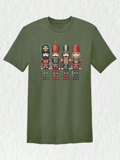 **Nutcrackers Shirt - Spread Holiday Cheer in Style!** Get ready to embrace the holiday spirit with our delightful **Nutcrackers Shirt**! This cute Christmas tee is perfect for family gatherings, festive parties, or simply lounging at home while sipping hot cocoa. Made from a soft and breathable cotton blend, this shirt ensures maximum comfort, so you can enjoy all your holiday activities without a hitch. Available in a variety of sizes, this shirt is designed to fit everyone in the family, making it a fantastic choice for matching holiday outfits or a thoughtful Christmas gift for loved ones. Our **Nutcrackers Shirt** features a charming and whimsical design inspired by the beloved Sugar Plum Fairy and classic nutcracker characters. The retro Christmas vibe adds a touch of nostalgia, maki Matching Holiday Outfits, Classic Nutcracker, Nutcracker Shirt, Nutcracker Characters, Fairy Shirt, Retro Christmas Shirt, Plant Texture, Cute Christmas Shirt, Christmas Vibe