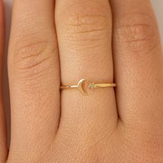 Astrid Just for you, the moon, and the stars. Handcrafted in 14k or 18k solid gold to ensure you never go without them. It is also available in different sizes for the best comfort fit. - Handmade- Solid Gold- Band Thickness: 1.1 mm- Size of the Moon: 4.5 mm- Size of the Star: 2.5 mm All pieces come beautifully boxed in suede pouches you can always use when traveling! Dainty Moon Ring, Moon Gold Ring, Moon Ring Design, Moon Rings, Travel Ring, Star Rings, Stars Ring, The Moon And The Stars, Ring Moon