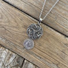 "Celtic Triskelion necklace....1 1/2\" tall with bail by 1 1/8\" wide at the widest spot, cast and antiqued in sterling silver 925...the chain is 20\" long also in sterling silver 925 with a lobster catch" Engraved Pewter Necklace With Round Pendant, Spiritual Engraved Pewter Necklace, Triskelion Necklace, Hand Forged Silver Viking Jewelry, Symbolic Antique Silver Nickel-free Necklace, Celtic Triskelion, Silver Viking Necklace With Oxidized Finish, Symbolic Silver Necklace With Tree Of Life, Viking Oxidized Pendant Necklace