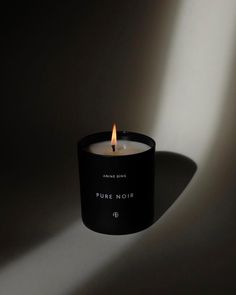 a candle that is sitting in the dark