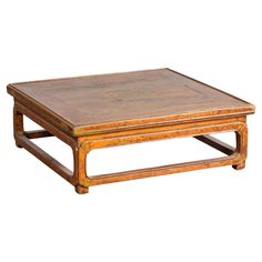 a wooden coffee table with two trays on top