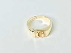 On display is a gold monogram ring available in 10K, 14K. Customizable embossed or laser inscription -  just message for specifics (font, symbols etc) 14k Gold Engraved Ring With Initials For Collectors, Personalized Engraved Yellow Gold Ring For Collectors, Personalized Yellow Gold Signet Ring Collectible, Collectible Yellow Gold Signet Ring With Initials, Classic Gold Initial Ring Collectible, Gold Engraved Initial Ring, Gold Engraved Initial Ring Collectible, Antique Personalized Yellow Gold Signet Ring, Personalized Antique Yellow Gold Signet Ring