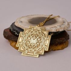 14K Gold Handmade Sri Yantra Necklace - Spiritual Gold Necklace, It can be considered a spiritual gift. Pendant Details 💎 Gold KT: 14K Solid Gold or 8K Solid Gold 💎Gold Color Options: Yellow Gold, White Gold, Rose Gold 💎Thickness: 0.80 mm ✈️ Ready to Ship in 4-7 Business Days ✈️ Transportation is provided by express cargo MORE OF US Pendants and Necklaces: https://goldencastlejewelry.etsy.com NECESSARY INFORMATION 🧡 We provide workshop service in Ankara, we are happy to share our knowledge a Luxury Ceremonial Temple Necklace Pendant, Spiritual Medallion Jewelry, Spiritual Hallmarked Jewelry For Puja, Spiritual Round Pendant Necklace For Diwali, Yellow Gold Spiritual Jewelry For Puja, Brass Necklace As Diwali Gift, Spiritual Yellow Gold Jewelry For Puja, Handmade Amulet Necklaces For Puja, Symbolic Jewelry For Puja And Festivals