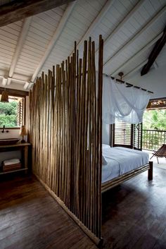 an image of a bed made out of bamboo sticks