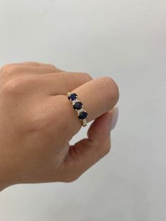 Blue cubic zirconia ring, in 14k gold, size 7 but we can make it to the custom you need, you can wear it daily, it will not change color, it will not stain your skin, you can even bathe or swim using this piece, send a message if you have a question, item sold by piece, weigh undetermined. 14k Gold Blue Three Stone Jewelry, Blue Diamond Promise Ring In 14k Gold, Blue Sapphire Ring In 14k Gold For Promise, Blue Three Stone Sapphire Promise Ring, Blue Sapphire Promise Ring In 14k Gold, 14k Gold Sapphire Ring With Vs Clarity, Blue Sapphire Three-stone Promise Ring, Blue Sapphire Three-stone Birthstone Ring, Blue Three Stone Birthstone Ring