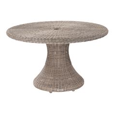 a round wicker table with wheels on the top and bottom, made from rattan