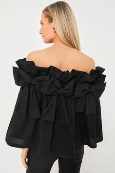 The Linden Blouse is our current obsession! Equal parts feminine and dramatic, this top boasts an off-the-shoulder ruffle neckline with large black bows encircling the bodice. An easy throw-on style that instantly makes you look like you stepped out of Hollywood, we are pairing this with black pants, heels, and statement earrings for an eye-catching ensemble. Elasticated off-the-shoulder neck Ruffle neckline Large bows around neckline Full body A-line silhouette Lined Material: 97% Polyester, 3% Black Bows, Current Obsession, Plus And Minus, Cocktail Attire, Neck Ruffle, Black Bow, Pullover Sweatshirts, Fall Trends, Black Blouse