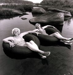 two women laying on an inflatable floating object with the caption, friends isn't a big thing it's a million little things