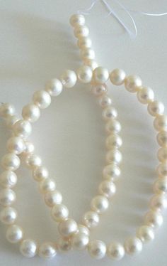 You get: 15" natural white color round potato freshwater pearl,7-8mm, approx 59 beads.The surface have a high luster, and at least 75% of the surface are free from any type of defect. Undyed natural color for long-wearing design classics. Pearls are well shaped, with high luster and minor surface blemishes.Larger quantities available. Ask me. Pearl White Hypoallergenic Round Beads Jewelry, White Faceted Round Beads, Pearl Shell, Pearl Beads, Fresh Water, Cool Things To Buy, Freshwater Pearls, Etsy Gift Card, Beads