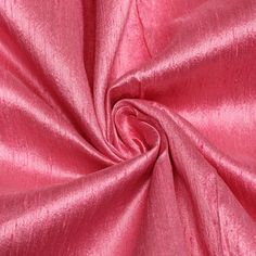 a close up view of a pink fabric