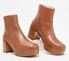 Chunky, funky, and totally chic, these stacked heeled ankle boots are here to slay with their unrivaled splash of style. Pair them with flared jeans to make a bold fashion statement. From Intentionally Blank.\n\nOriginal item is A548928. This product may be a customer return, vendor sample, or on-air display and is not in its originally manufactured condition. It may not be new. In some instances, these items are repackaged by QVC. Retro Stacked Heel Boots For Fall, Retro Boots With Stacked Heel For Fall, Retro Fall Boots With Stacked Heel, Retro Ankle-high Heeled Boots For Fall, Spring Platform Moto Ankle Boots, Trendy Spring Boots With Block Heel, Spring Trendy Boots With Block Heel, Fall Ankle Boots With Wooden Heel, Modern Brown Heeled Boots For Spring