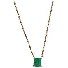 This drop solitaire pendant necklace features an emerald l cut, medium green natural Colombian emerald weighing 1.15 carats. Set in 18K yellow Gold setting and fixed to a 18 Inches long, gold chain. Very style good for every day wear! Classic Green Necklace With Rectangular Pendant, Classic Green Emerald Pendant Necklace, Luxury Green Emerald Cut Necklace, Formal Emerald Rectangular Pendant Necklace, Formal Emerald Necklace With Square Pendant, Luxury Rectangular Emerald Necklace, Rectangular Emerald Necklace In Fine Jewelry Style, Luxury Green Square Pendant Necklace, Emerald Rectangular Pendant Necklace For May Birthstone