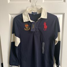 Priced To Sell: Brand New Boys Size 10-12 Long Sleeve Collared Shirt. Preppy Navy Cotton Top, Preppy Blue Polo Collar Top, Blue Crew Neck Preppy Tops, Preppy Blue Crew Neck Tops, Blue Preppy Crew Neck Top, Blue Collared Preppy Tops, Preppy Cotton Long Sleeve Tops, Preppy Long Sleeve Cotton Tops, Preppy Blue Collared Top