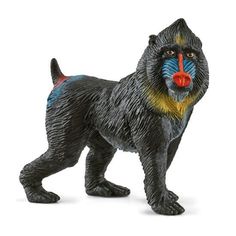 a plastic toy dog with a red nose and black body, standing on its hind legs