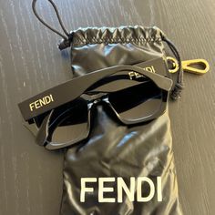 Black Fendi Sunglasses With Faded Lenses And Large Gold Logo On The Sides. Bought Last Year And Rarely Wore. Fendi Sunglasses, Fendi Accessories, Gold Logo, Sunglasses Accessories, Lenses, Fendi, Women Accessories, Sunglasses, ? Logo