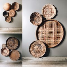 some baskets are hanging on the wall and one is made out of wickers