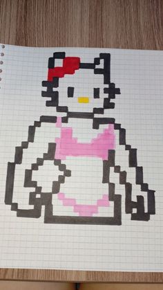 a drawing of a hello kitty sitting on top of a piece of paper