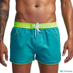 Orcajump - Versatile Solid-Colored Low-Rise Bermuda Shorts: Wide-Legged, Relaxed Fit Athletic Shorts in Multiple Colors Stretch Green Swim Trunks With Pockets, Green Stretch Swim Trunks With Pockets, Green Summer Sports Bottoms, Green Short Pants For The Beach, Green Short Pants For Beach, Green Short Beach Pants, Green Sports Pants For Summer, Green Pants For Sports In Summer, Green Summer Sports Pants