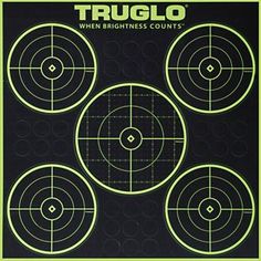 a black and green target poster with four circles on the front, three in the middle