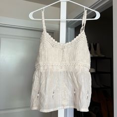 White Peplum Shyanne Top From Boot Barn Never Worn Feminine Sleeveless Crochet Top With Crochet Trim, Feminine Cotton Crochet Top With Crochet Trim, White Crochet Lace Top For Day Out, Feminine Lace Crochet Top For Vacation, Casual White Lace Trim Top, Cream Cotton Crochet Top For Vacation, White Feminine Lace Top With Crochet Trim, White Crochet Top With Crochet Trim For Spring, Cream Lace Top With Crochet Trim For Beach