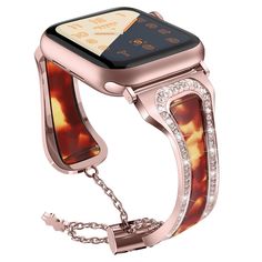 an apple watch with a chain attached to it