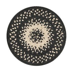 a black and white round rug on a white background