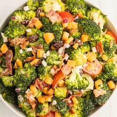 a bowl filled with broccoli and other vegetables