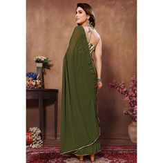 Green colored saree is made from georgette fabric which is highlighted with weaving checks & lace border work as shown with pleats are stitched and size adjusted belt. comes along with printed banglori silk blouse which you can customise as per your design/style. Occasion - You can wear this saree for parties, functions and events. Note:- the actual product may differ slightly in color and design from the one illustrated in the images when compared with computer or mobile screen. Measurements: S Mobile Screen, Georgette Saree, Georgette Fabric, Lace Border, Georgette Sarees, Design Style, Silk Blouse, Checks, Ready To Wear