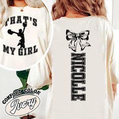 Custom That's My Girl Cheer Mom Sweatshirt, Personalized Gift For Cheer Mom Dad, Football Mom Shirt, Cheer Mom Shirt, Cheer Bows, Football Bow Hey there! A quick heads up: Our Comfort Colors Tee is a standard unisex size. If you want a cozy, oversized fit, just size up! For that trendy "T-shirt Dress" look, go up 2 sizes. Don't forget to check out our size chart to get the perfect fit! Product Details - Custom Colors Unisex 1717 Garment Dyed Tee: Made from 100% ring spun cotton Soft washed garment dyed fabric for extra comfort Double needle collar for added durability Twill taped neck and shoulders Double needle armhole, sleeve, and bottom hems Keep in mind, colors might vary a bit due to different screen settings and the handmade touch Why You'll Love It: Our special dyeing process reduce Sporty Custom Print Tops For Fall, Fall Cheerleading Top With Letter Print, Custom Print Long Sleeve Top For College, Custom Print Long Sleeve College Tops, White Long Sleeve Top For Cheerleading, Long Sleeve T-shirt With Team Name For Cheerleading, Long Sleeve T-shirt With Letter Print For Cheerleading, Custom Print Cotton Tops For Cheerleading, Long Sleeve Graphic Print Cheerleading Top