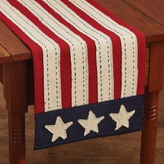 an american flag table runner with stars on it