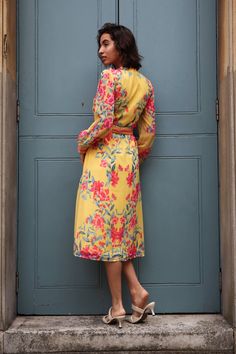 The Naomi Dress is a beautiful yellow midi dress featuring a floral pink print, detachable belt, v-neckline, and full-length sleeves. The comfort and elegance of this dress is perfect for both semi-casual events and special occasions. Dry Clean Only by a specialist dry cleaner unless otherwise instructed on the care label. Steam iron for best results. Semi Casual, Yellow Midi Dress, Steam Iron, Online Dress Shopping, Independent Designers Fashion, Floral Midi Dress, Pink Print, Yellow Floral, Yellow Orange