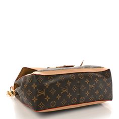 This is an authentic LOUIS VUITTON Monogram Dauphine Soft GM. This stylish shoulder bag is crafted of Louis Vuitton monogram on toile canvas. The bag features a vachetta shoulder strap, a gold chain strap, and a front facing flap with a vachetta trim, and a decorative brass Louis Vuitton logo clasp. This opens to a partitioned brown microfiber interior with zipper and patch pockets. Louis Vuitton Logo, Stylish Shoulder Bag, Authentic Louis Vuitton, Chain Strap, Gold Chain, Louis Vuitton Monogram, Patch Pocket, Gold Chains, Shoulder Strap