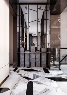 an elegant bathroom with black and white marble flooring, mirrored walls and mirrors on the wall