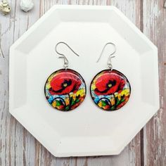 Red Flower Earrings With Colorful Stained Glass Background Bright Summer Jewelry Floral Accessory - Etsy Red Pressed Flowers Earrings For Gift, Red Hand-painted Flower Earrings For Gifts, Artistic Red Round Earrings, Handmade Red Flower Earrings, Multicolor Floral Print Earrings For Gift, Gift Floral Print Multicolor Earrings, Red Hand Painted Round Earrings, Artistic Red Resin Jewelry, Stained Glass Background